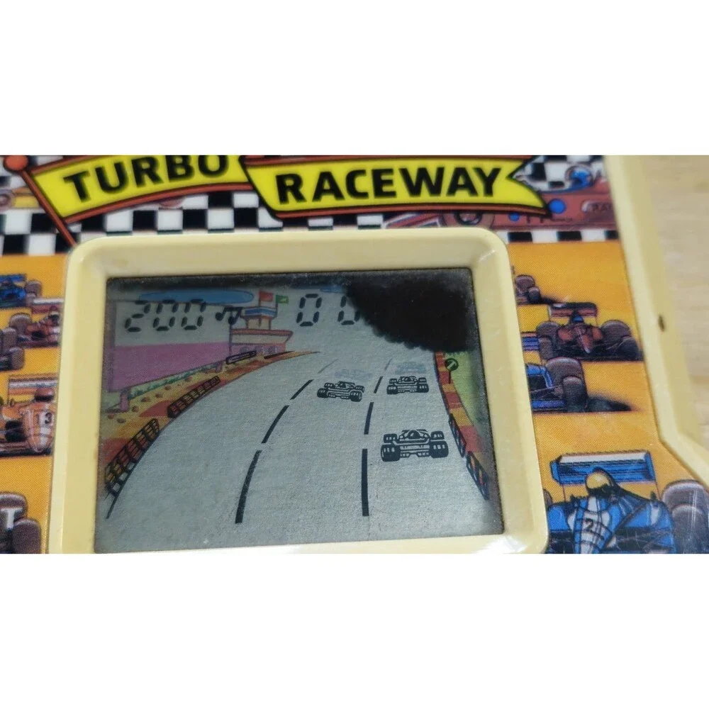 VINTAGE ELECTRONIC HANDHELD TURBO RACEWAY GAME RADIO SHACK TESTED + WORKS